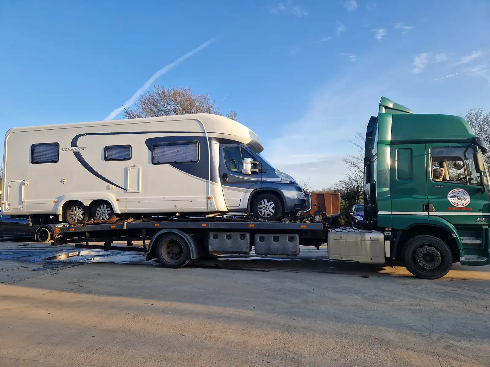 West Wales Recovery truck carrying a vehicle